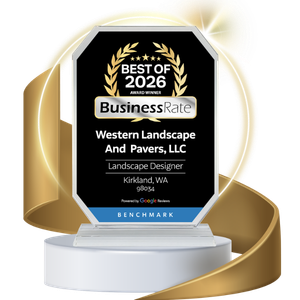A trophy plaque reads Best of 2026 Award Winner, Business Rate, awarded to Western Landscape And Pavers, LLC, Landscape Designer, Kirkland, WA. The plaque rests on a white pedestal with a gold ribbon swirl.